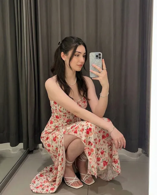 Maya in a floral summer dress